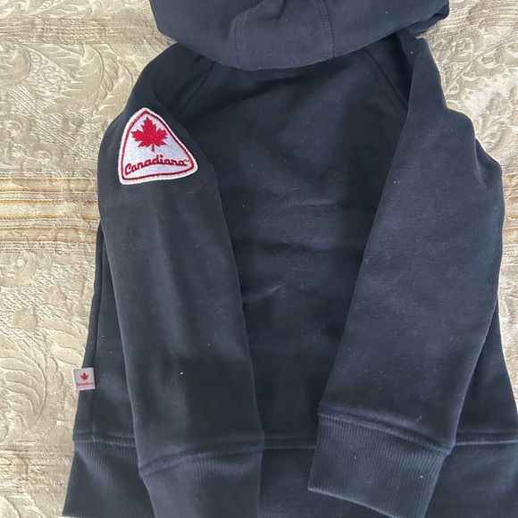 Hoodie, dark blue with front zipper and Canada on the front in white letters. - Picture 2 of 3